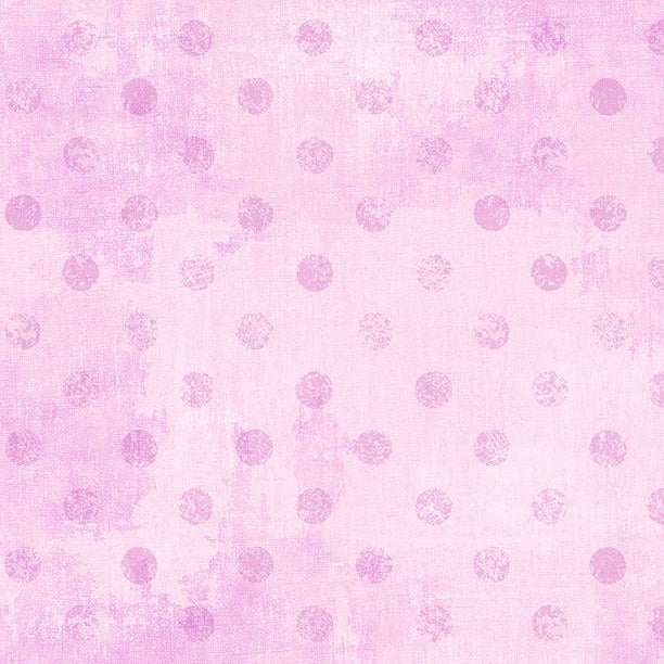 Pink polka dot pattern on a pink background