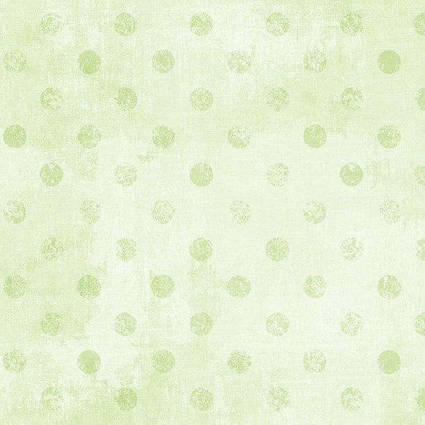 Light green background with polka dot patterns