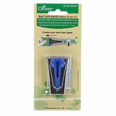 Packaged bias tape maker tool on a cardboard backing with branding and product information.