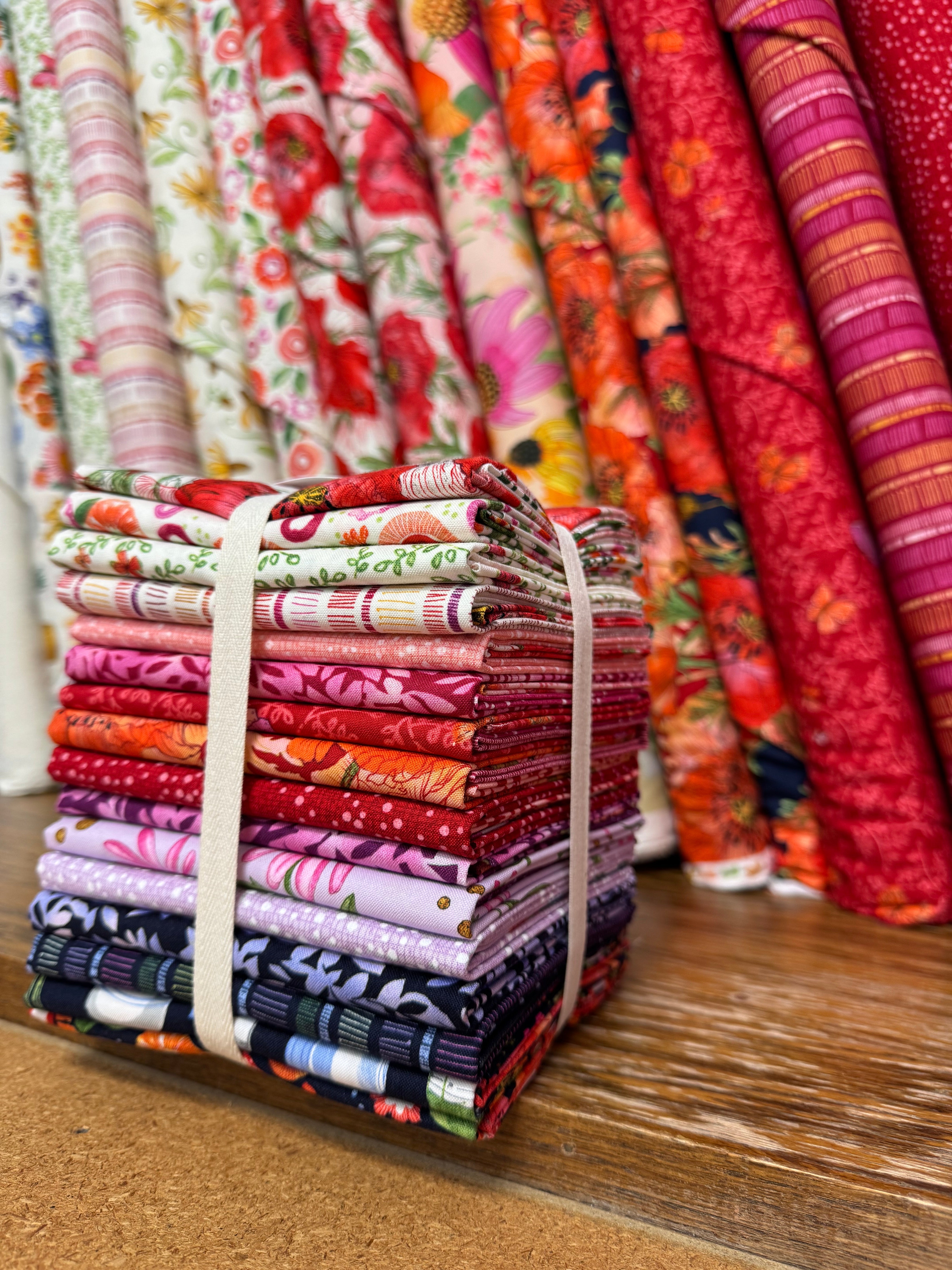 Superbloom fabric bundle in front of bolts