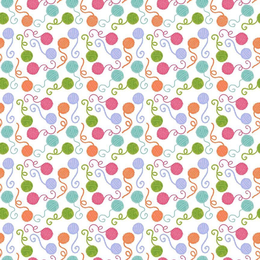Colorful pattern of yarn balls on a white background