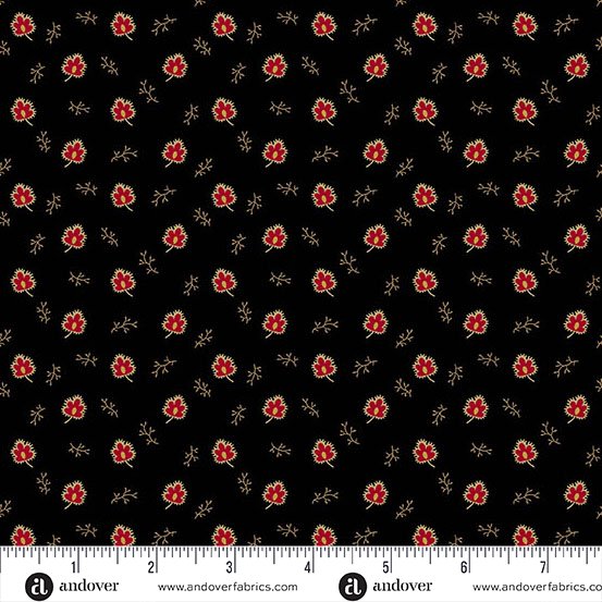 Floral pattern on black fabric with a ruler at the bottom